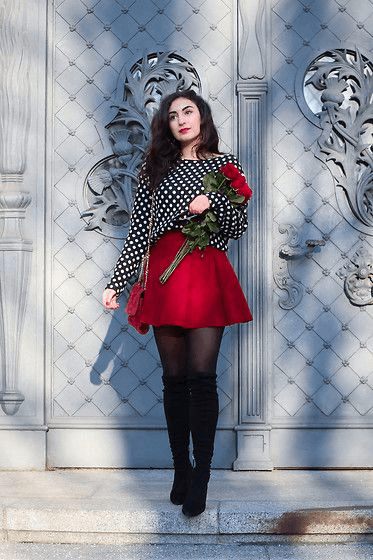 red skater skirt with a polka-dot blouse on top