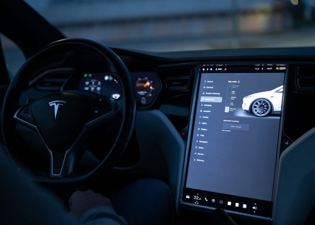 BMW iX3 vs Tesla Model 3 interior technology